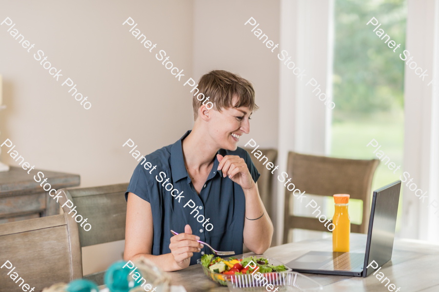 A young lady having a healthy meal stock photo with image ID: e54b60ed-ea93-448d-9918-377caa2d057e