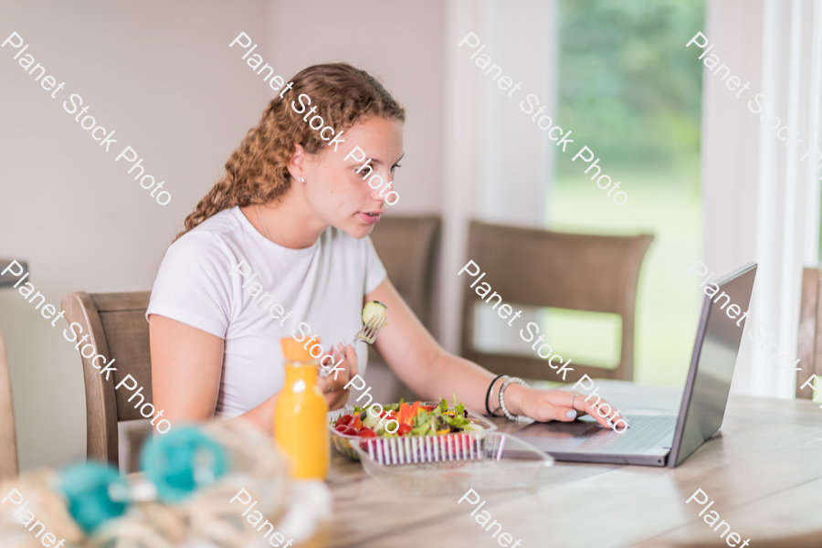 A young lady having a healthy meal stock photo with image ID: f3ab6283-fcdc-4db7-8da8-4486c249377e