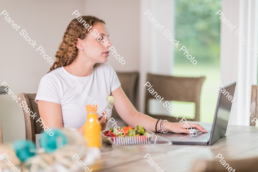 A young lady having a healthy meal stock photo with image ID: f5e8a292-89ef-4af1-b05b-72212dfb022a