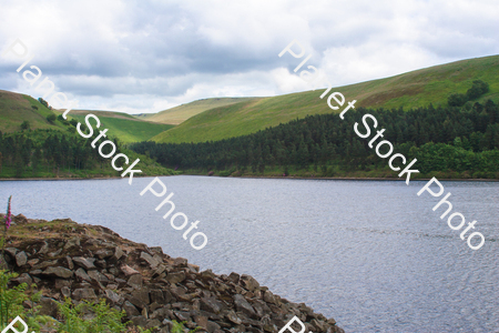 The Derwent dam under a blue sky stock photo with image ID: 061d9eda-ee8e-4396-b62f-3c429c64b373