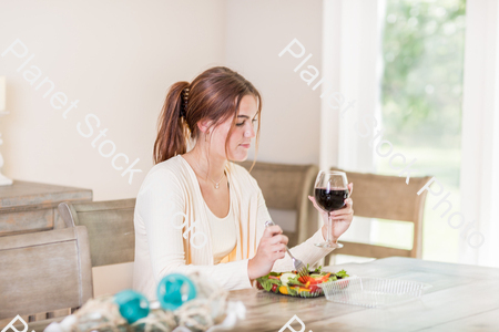A young lady having a healthy meal stock photo with image ID: 089d5443-bd94-4913-b0c1-ce39836856df