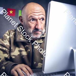 A Commando Is Hacking stock photo with image ID: 091b79de-edf1-4b11-8093-5066b7ccfecd
