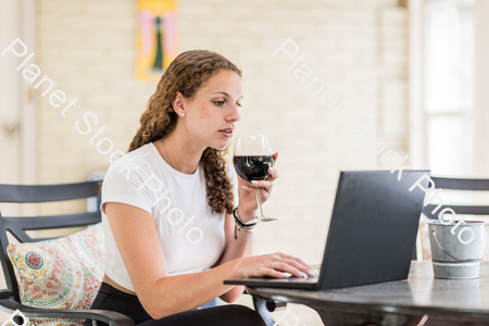 A young lady enjoying daylight at home stock photo with image ID: 0a7802b3-b885-4bdc-846c-43fb4fb12480