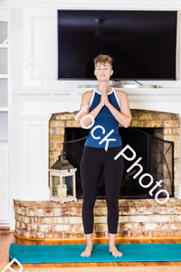 A young lady working out at home stock photo with image ID: 15671009-297b-4f1b-8f49-62f61c9eeff6
