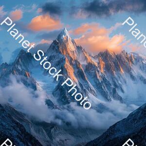 Mountains with Snow and with Cloudy Atmosphere stock photo with image ID: 1c2e8a93-bb5c-4893-92bf-f1b360b5a6b4