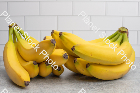 Two bunches of bananas stock photo with image ID: 24357c02-98ce-4649-a3a3-4f7fdfe20e36