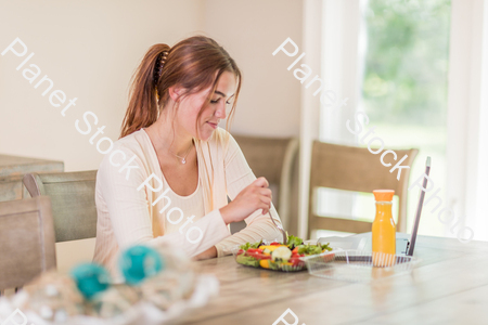 A young lady having a healthy meal stock photo with image ID: 25d8ae07-1a3f-4dae-9327-195269f0e63e