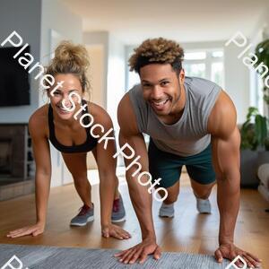 A Young Couple Working Out at Home stock photo with image ID: 2829d919-885a-428d-9cb8-3281dbcba051