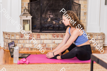 A young lady working out at home stock photo with image ID: 2a3953b4-9e76-4806-b5ca-1e217bfe8ae5