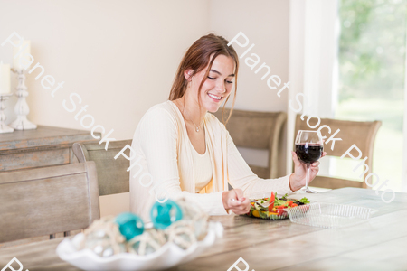 A young lady having a healthy meal stock photo with image ID: 43368fe4-0cd1-4f93-8a9e-55710cc643f2