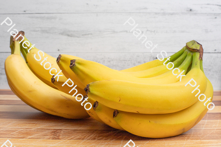 Two bunches of bananas stock photo with image ID: 4f4fb3d5-f8ec-47b8-b9f1-61daa1200058