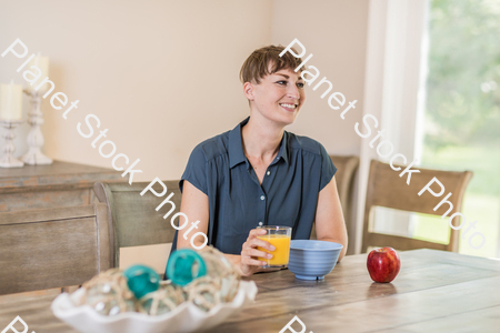 A young lady having a healthy breakfast stock photo with image ID: 59e7ab76-3dbf-48a4-bfb0-a76d934e4c94