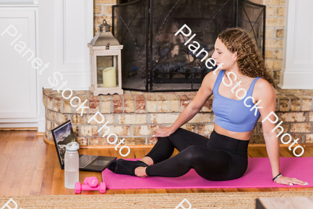 A young lady working out at home stock photo with image ID: 63abcf61-3369-4edf-abf2-c70a95f03e5b