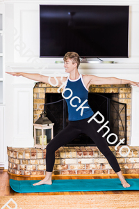 A young lady working out at home stock photo with image ID: 6c6d985f-0e84-4280-bdd7-95bb63ae4cc4