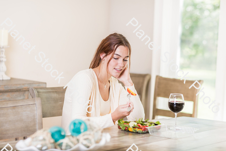 A young lady having a healthy meal stock photo with image ID: 6e6222ce-8de5-446e-ae39-a78c0d2fcfc9