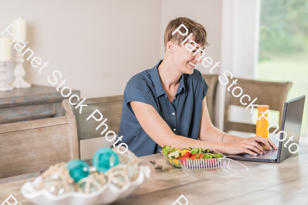 A young lady having a healthy meal stock photo with image ID: 6ebb1562-ebf5-4b1c-b72f-c8bd60a06298