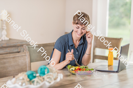 A young lady having a healthy meal stock photo with image ID: 757f2e23-d9ca-47f6-9858-67ce8b19925e