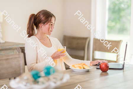 A young lady having a healthy breakfast stock photo with image ID: 79d2e6d4-4262-47e9-beb3-b5b6eb26e061
