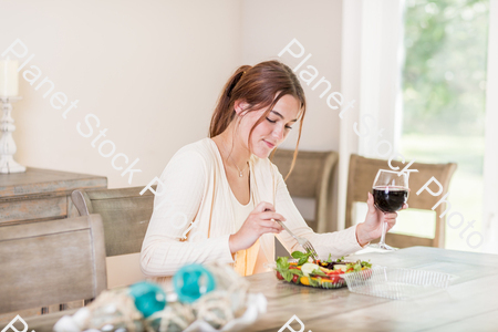 A young lady having a healthy meal stock photo with image ID: 8e0ab231-bbcb-4f65-bb4e-82ee9d04289f