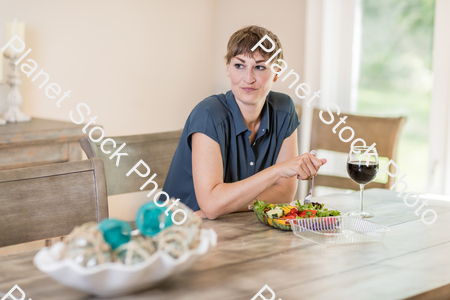 A young lady having a healthy meal stock photo with image ID: 8f371472-7fc5-41b5-a64c-872cf762d16d