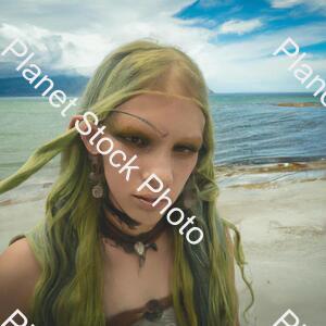 Green Hair Viking Girl in a Beach stock photo with image ID: 9adf7467-bc11-4777-9e78-83ebb6303660
