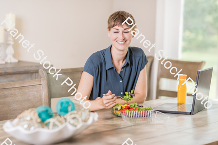 A young lady having a healthy meal stock photo with image ID: 9be90411-7707-4faf-822e-16fff18b6bf1