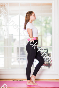 A young lady working out at home stock photo with image ID: a08e2d29-0621-4db8-be51-120a4964ca83