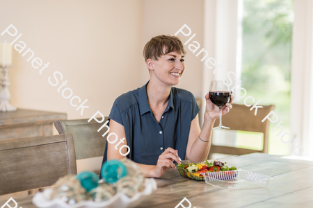 A young lady having a healthy meal stock photo with image ID: b7a3cf61-befb-47fd-911a-c31221f07b77