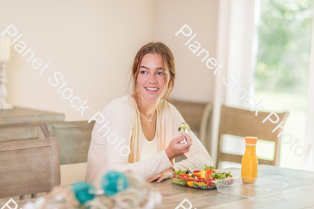 A young lady having a healthy meal stock photo with image ID: baa894d2-8c9d-4555-8b08-29d864762884