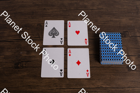 Four aces playing cards. Four playing cards of the same rank stock photo with image ID: be137afc-8c81-4d3c-93dd-c12f8400ebce