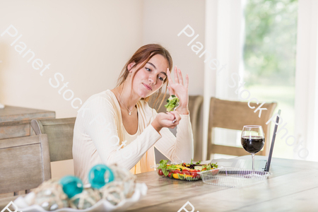 A young lady having a healthy meal stock photo with image ID: be2498b3-7065-427a-8ef1-25d9221fae20