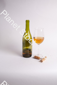 One bottle of white wine, with wine glass, and corkscrew stock photo with image ID: c46f436c-3eca-4c4c-b790-9f9e5207923e