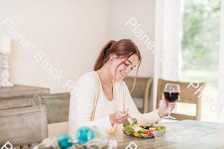 A young lady having a healthy meal stock photo with image ID: c7f25470-8b16-44e8-9842-9f39a27d5577