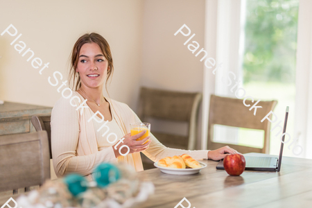 A young lady having a healthy breakfast stock photo with image ID: ca626e8e-dfe2-48d0-a1bf-902ae1cbf741