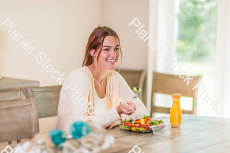 A young lady having a healthy meal stock photo with image ID: d1c6506b-72c8-4dcd-b636-ffd5a61122c5