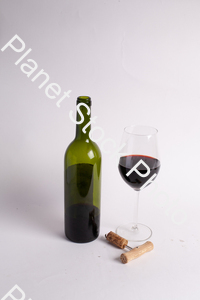 One bottle of red wine, with wine glass, and corkscrew stock photo with image ID: d8fb68b8-2ec7-4385-bd6d-6f58e052387a