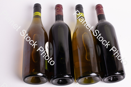 Four bottles of wine stock photo with image ID: db4bfb74-b585-4484-aac4-bf321e3c1c3b
