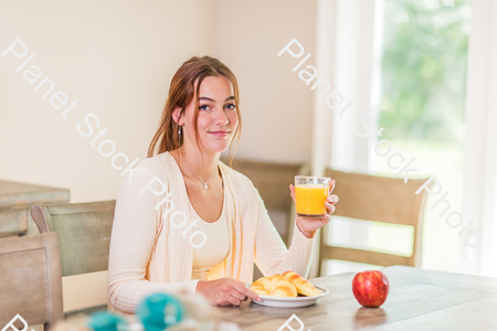 A young lady having a healthy breakfast stock photo with image ID: e7a0c9dc-7ca1-4b5f-8d4b-2ebfe87c3a98