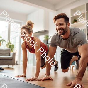 A Young Couple Working Out at Home stock photo with image ID: e9c5d489-6ab8-4133-8fe5-5006a3d51d86