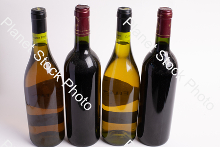 Four bottles of wine stock photo with image ID: e9ed1258-ec08-4c4e-bc56-f6ae42e3d202