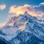 Mountains with Snow and with Cloudy Atmosphere