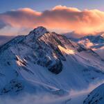 Mountains with Snow and with Cloudy Atmosphere