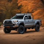 Orange with Grey Fenderstoyota Pick Up Truck with Long Travel Suspension and Baha Lights