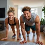 A Young Couple Working Out at Home.