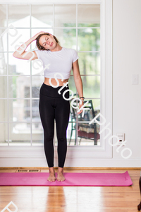 A young lady working out at home stock photo with image ID: 0c2f936d-ff30-4582-a098-16de90c58dc4