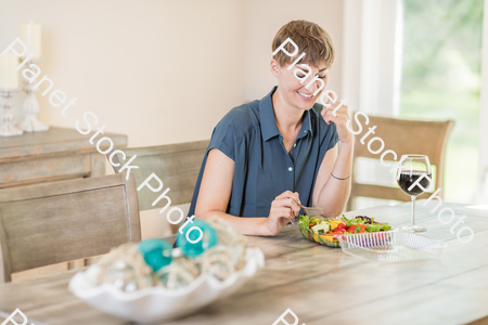 A young lady having a healthy meal stock photo with image ID: 0f349555-3a87-4fdd-aab2-1b59375cca1c