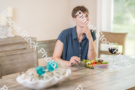 A young lady having a healthy meal stock photo with image ID: a93c35d5-b650-45f7-a687-034606bdfff1