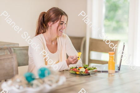 A young lady having a healthy meal stock photo with image ID: 05aa95de-16cc-4633-a5f4-0b867b079167