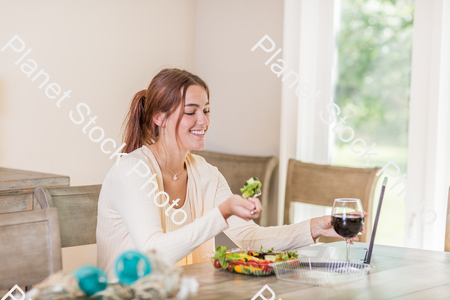 A young lady having a healthy meal stock photo with image ID: 303f10e9-dcd1-4cda-af1a-1ee7c67a3894