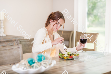 A young lady having a healthy meal stock photo with image ID: 76bbf7e9-0181-4455-bf30-f2a459954927